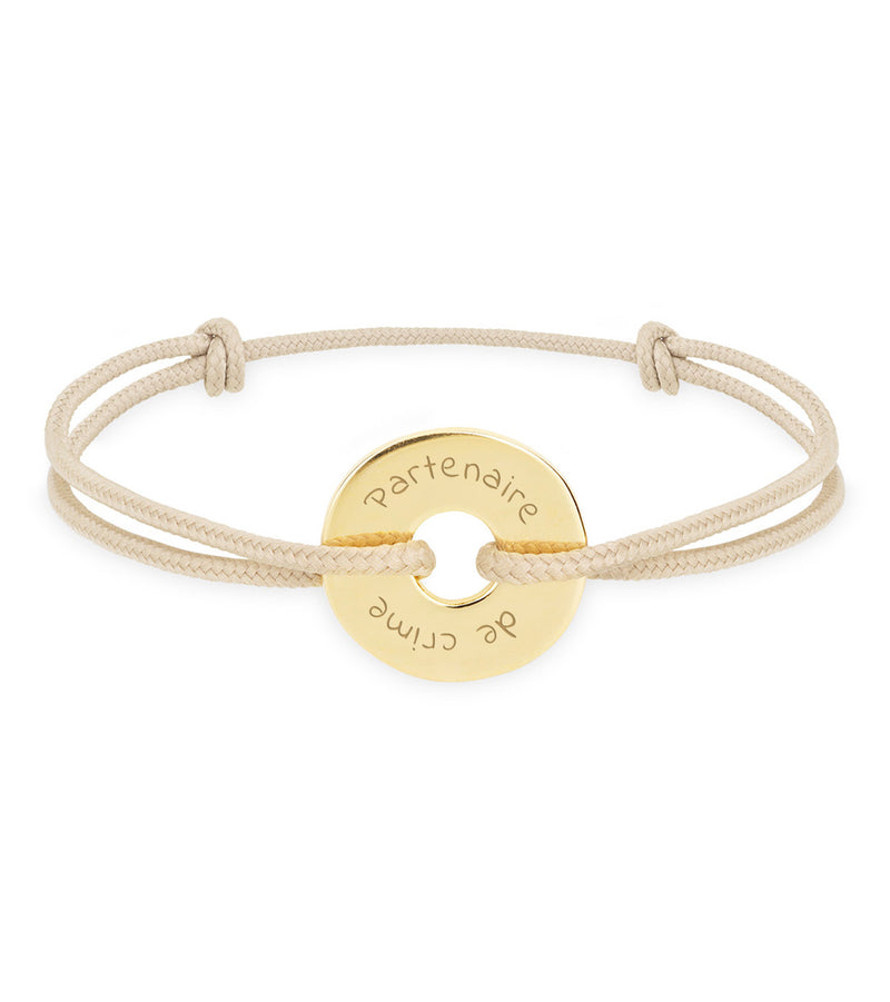 Personnalisé en 15mm, ce bracelet plaqué or arbore une forme cible et un cordon beige.