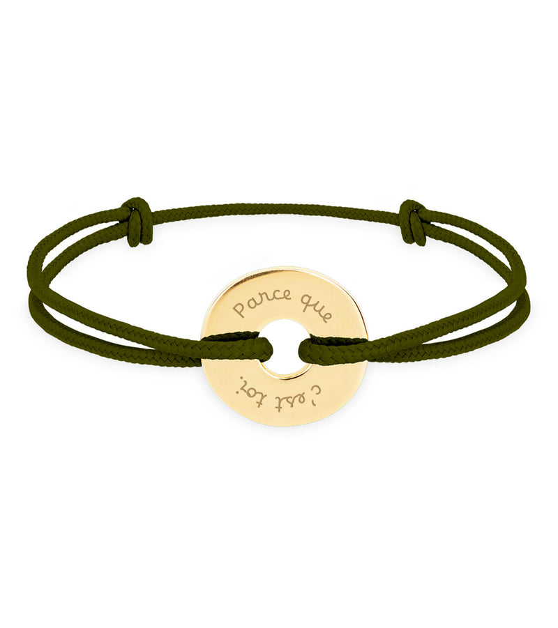 Ce bracelet plaqué or, de forme cible et personnalisé en 15mm, est assorti d'un cordon bleu kaki.