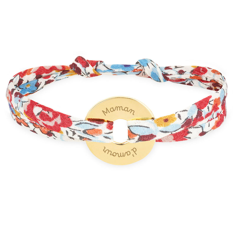 Avec le liberty Pavot comme lien, ce bracelet personnalisé en forme de cible est plaqué or 15mm.
