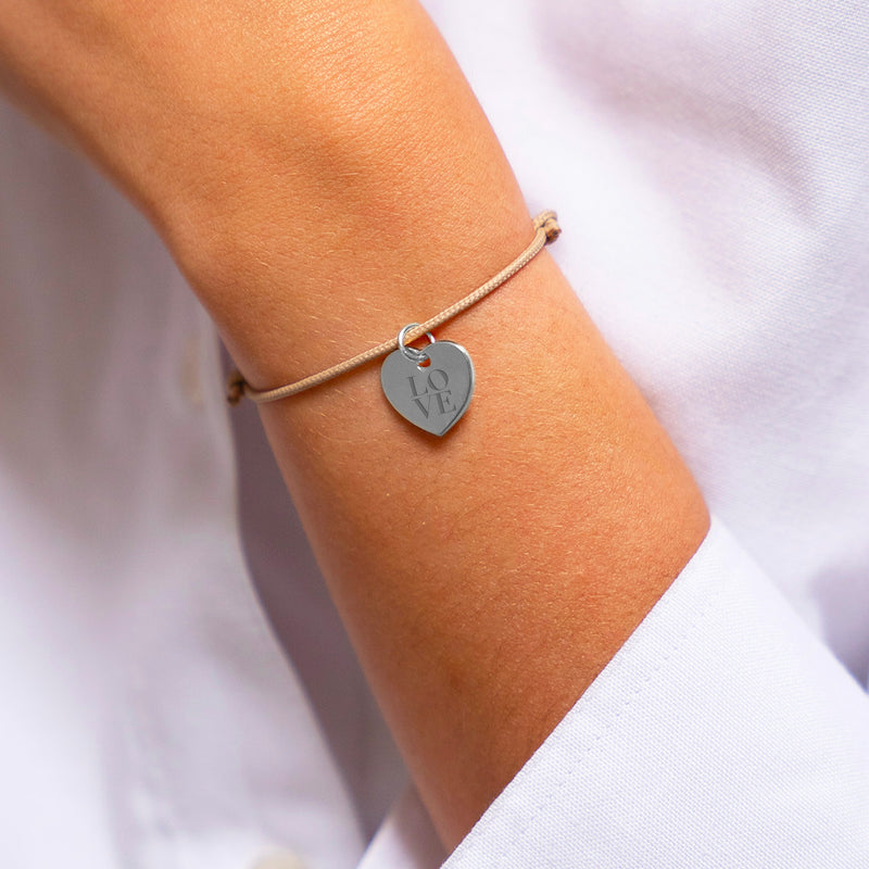 Délicat bracelet argent, coeur cordon beige