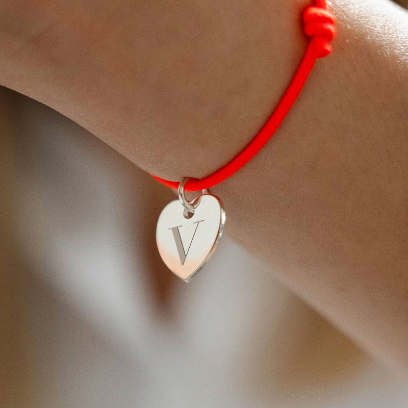 Ravivez votre style avec ce Bracelet Personnalisé, une déclaration d'amour en argent et cordon orange fluo.