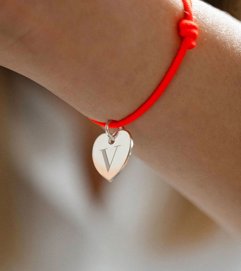 Ravivez votre style avec ce Bracelet Personnalisé, une déclaration d'amour en argent et cordon orange fluo.
