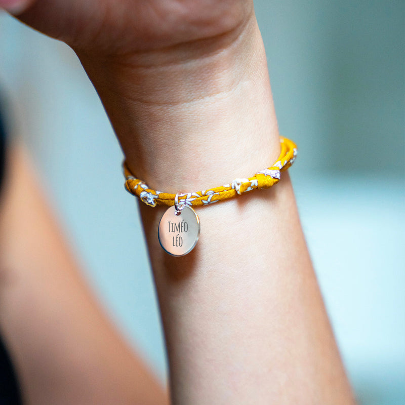 Bracelet en argent, médaille de 15mm sur fond Liberty Clivia.