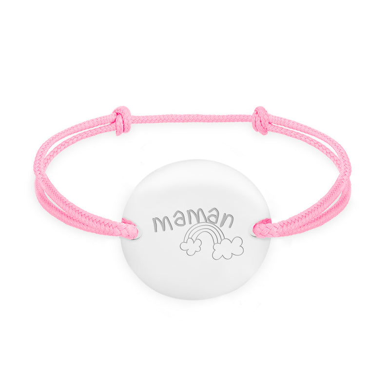 Un bracelet médaille, personnalisé en 20mm, avec deux trous argent et un cordon rose.