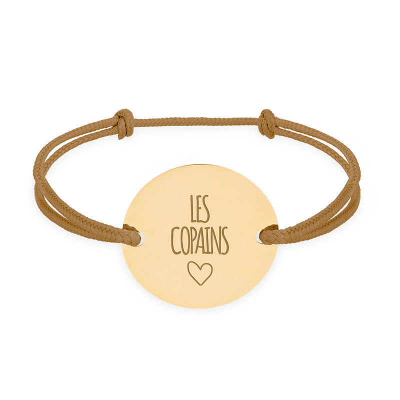 Bracelet médaille personnalisé en 20mm, avec deux trous en plaqué or et cordon marron clair.