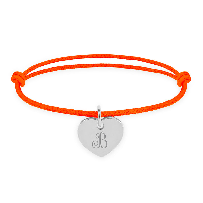 Laissez briller votre cœur avec ce Bracelet Personnalisé en argent et cordon orange fluo, une touche de couleur pour votre look.