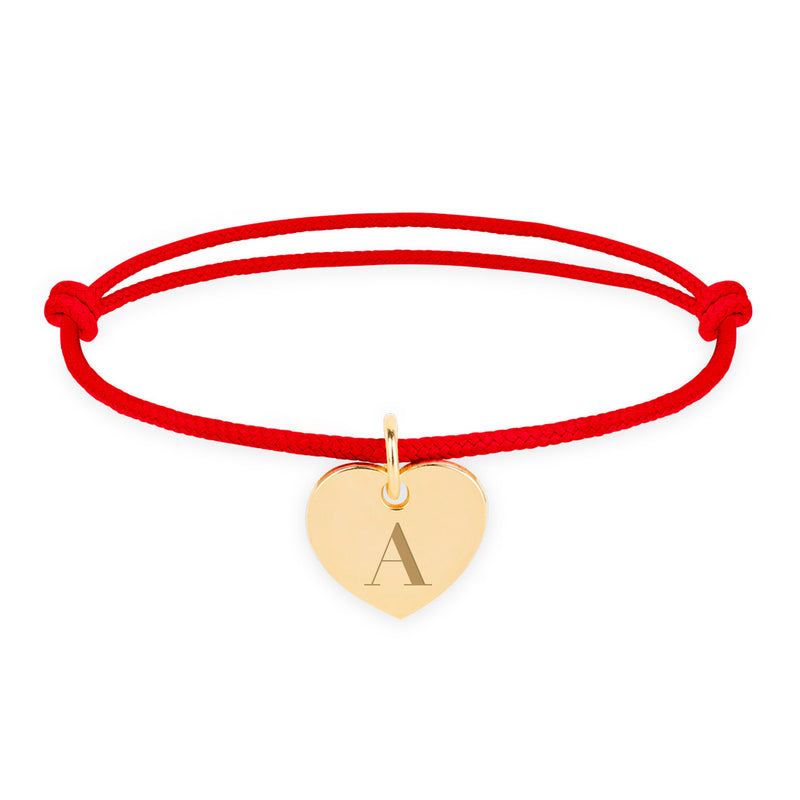 Bracelet cordon rouge, agrémenté d'un cœur plaqué or de 15mm