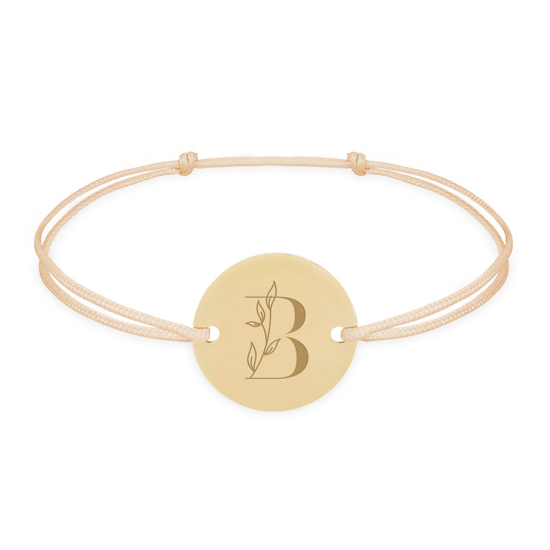 Bracelet personnalisé, agrémenté d'une médaille de 15mm plaquée or et de deux trous, avec un cordon beige