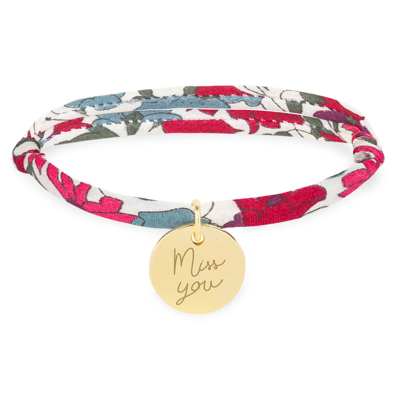 Dévoilez votre style avec ce magnifique Bracelet Personnalisé Médaille 15mm Plaqué Or, orné d'une ravissante médaille. Le lien Liberty Jacinthe ajoute une touche de couleur éclatante.