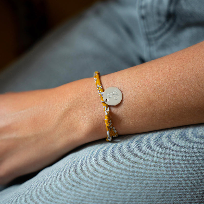 Bracelet en argent avec médaille de 15mm, orné d'un Liberty Clivia.