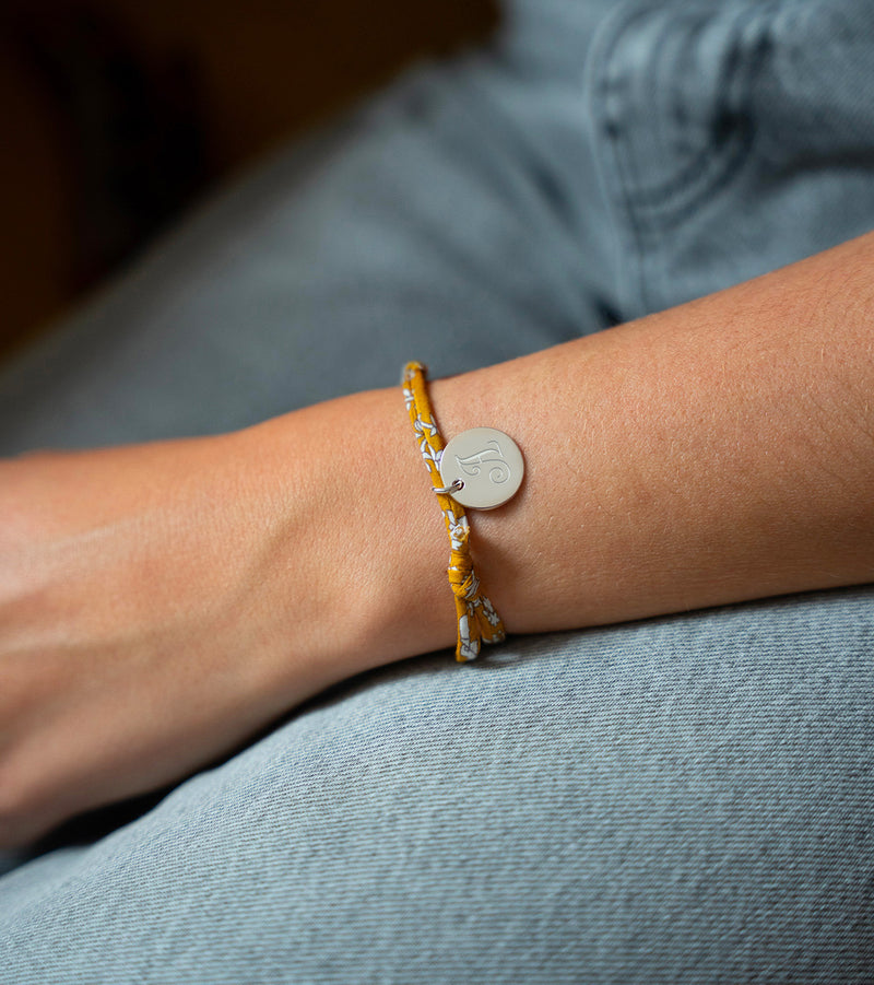 Bracelet en argent avec médaille de 15mm, orné d'un Liberty Clivia.