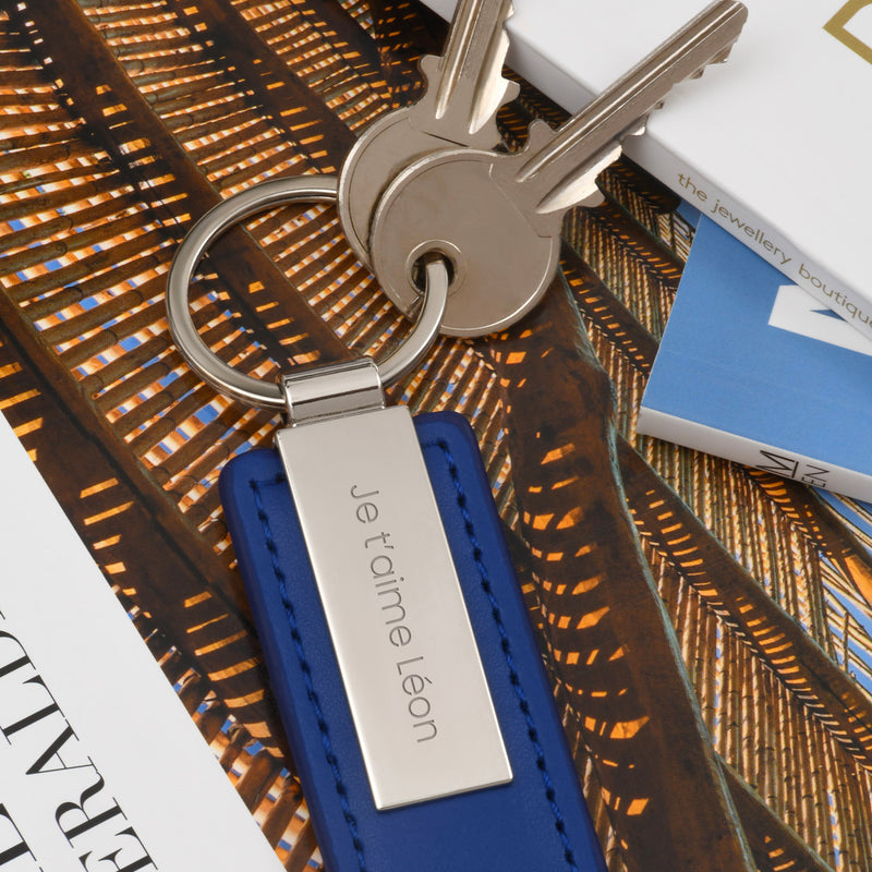 Porte clé personnalisé 63mm x 30mm en cuir PU bleu avec un anneau rond en acier inoxydable