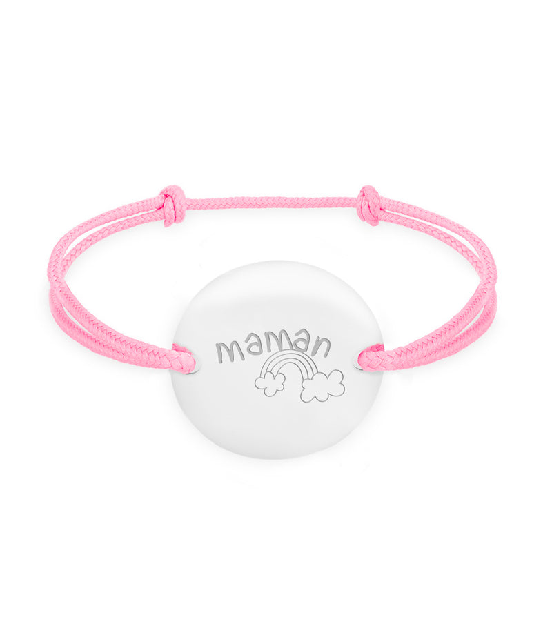 Un bracelet médaille, personnalisé en 20mm, avec deux trous argent et un cordon rose.