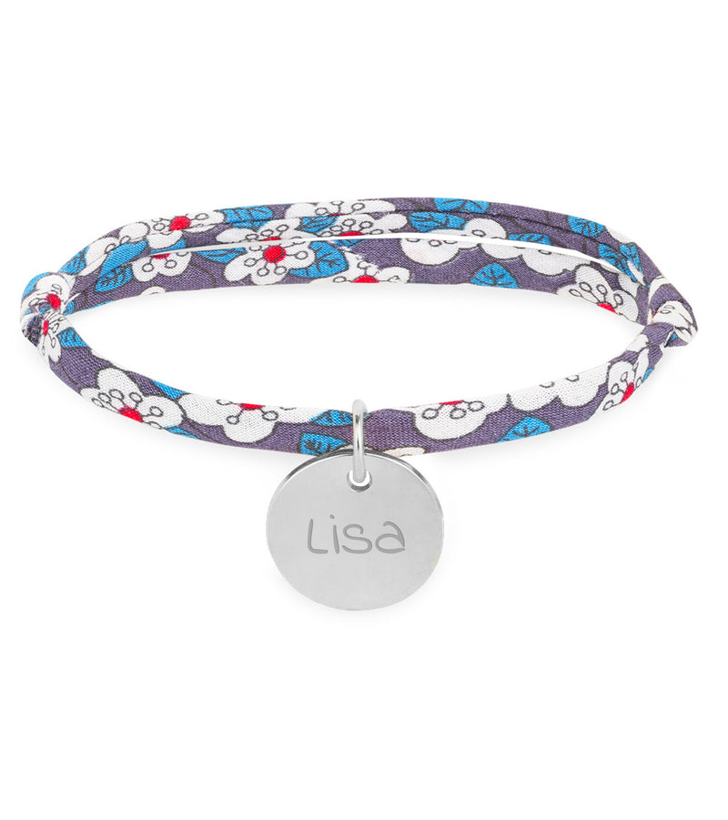 Bracelet argenté orné d'une médaille de 15mm, rehaussé d'un lien en Liberty irisé.