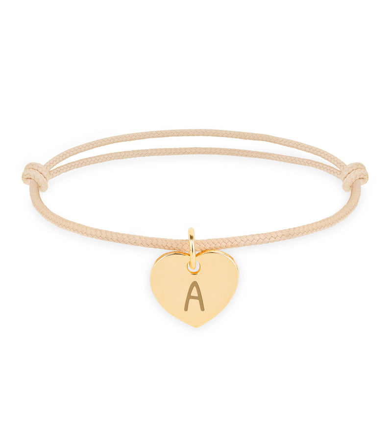 Bracelet personnalisé avec un cœur de 15mm en plaqué or, cordon beige.