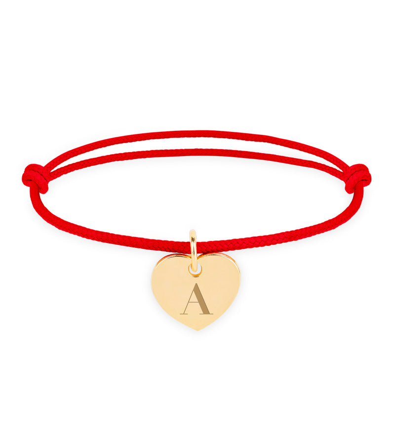 Bracelet cordon rouge, agrémenté d'un cœur plaqué or de 15mm