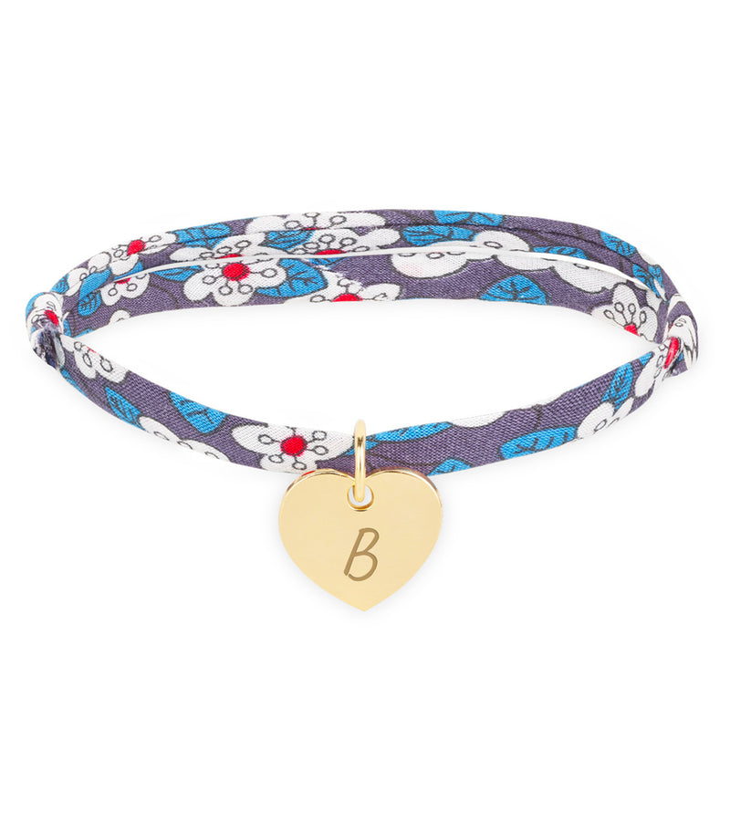 Élégant bracelet personnalisé avec un cœur de 15mm plaqué or, entouré d'un magnifique lien Liberty Iris.