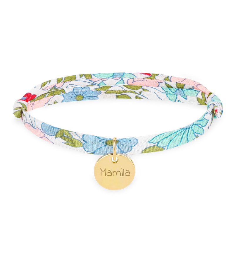Bracelet en Liberty Hortensia avec médaille plaquée or de 10mm. Ajoutez une touche élégante à votre tenue.