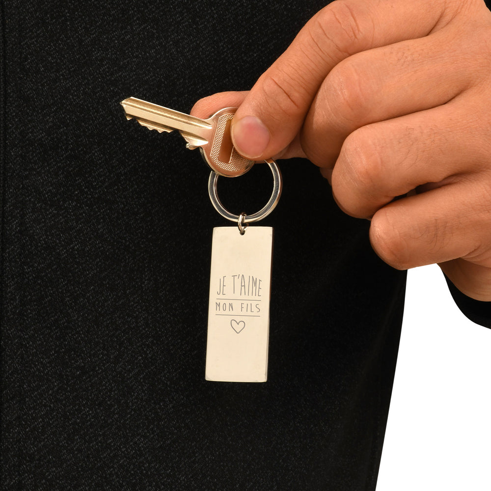 Porte clé avec une plaque de 50mm x 22mm en acier inoxydable et un anneau rond personnalisable
