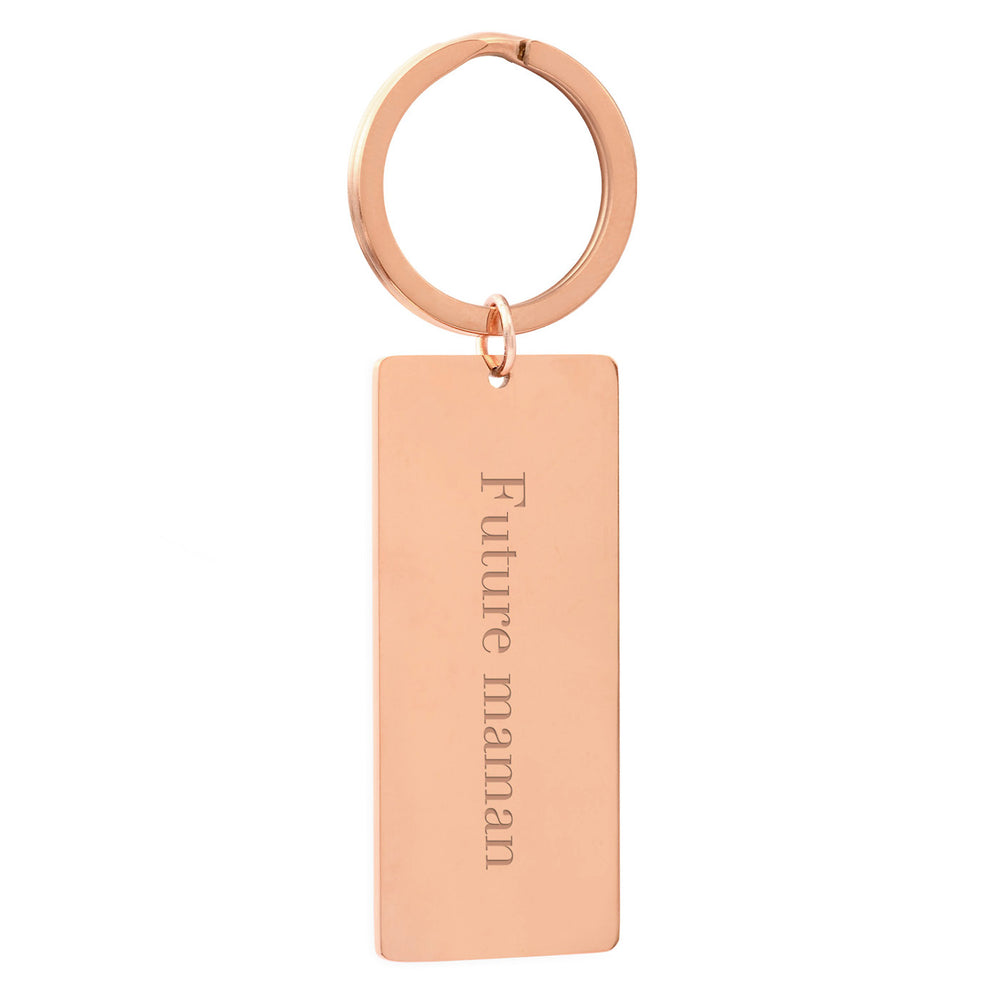 Porte-clé en acier inoxydable doré rose personnalisable, en forme de plaque de 50 mm x 22 mm, avec anneau rond pour accrocher vos clés.


